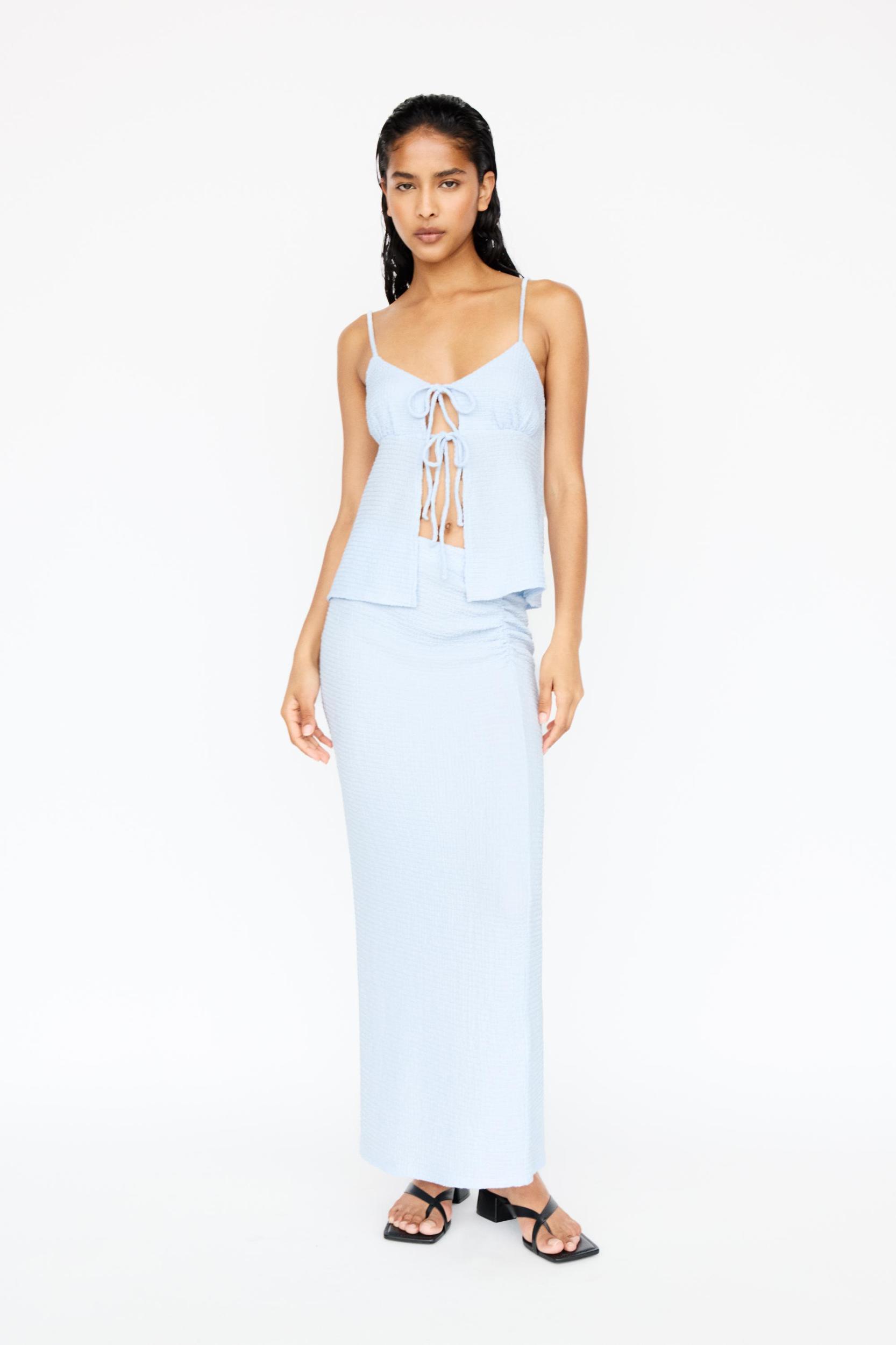 Creased-effect top with bows Product Image