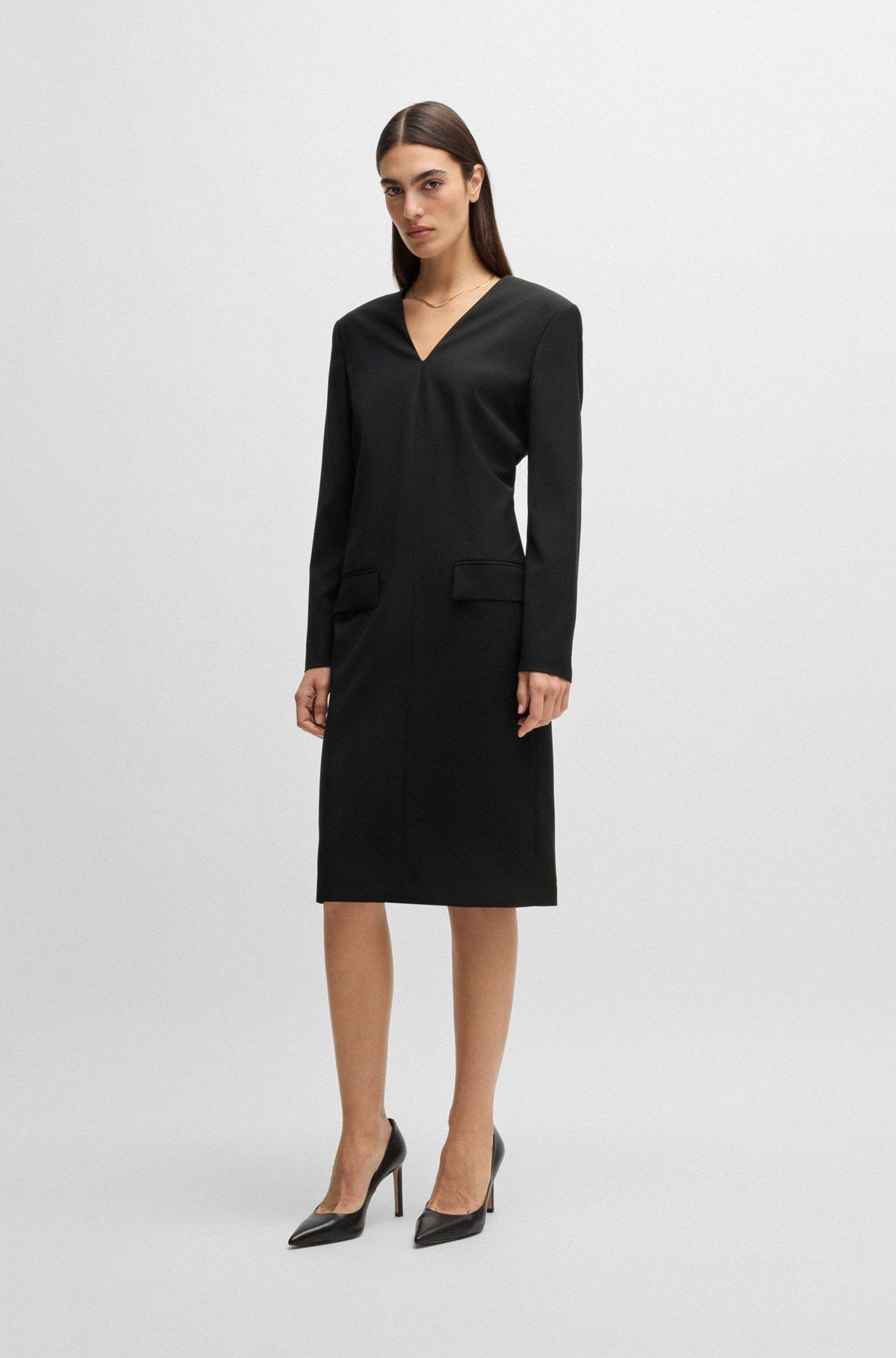 Tailored V-neck dress with flap pockets in relaxed fit Product Image