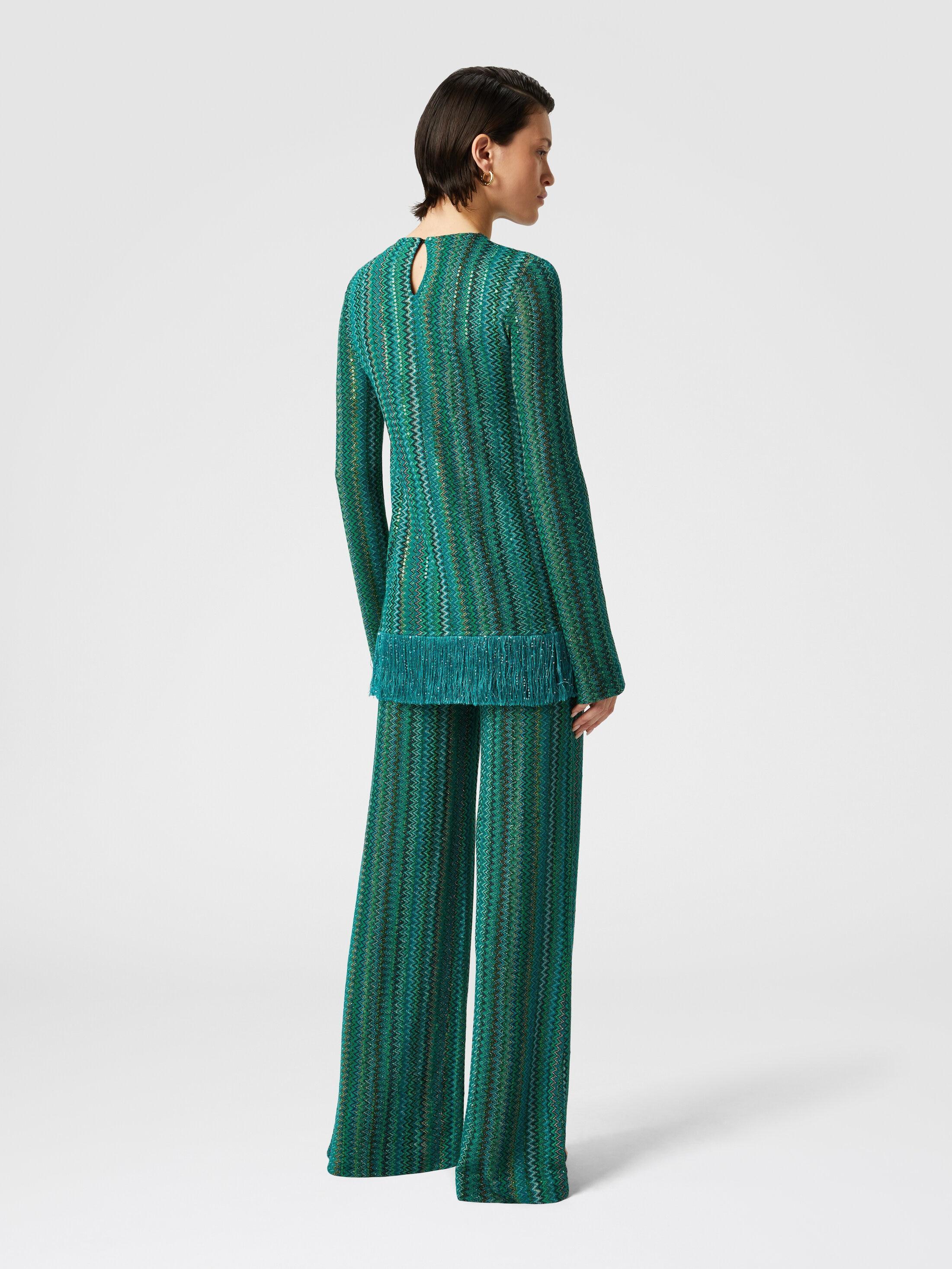 Zig zag sweater with sequins and asymmetrical hem with fringes Product Image