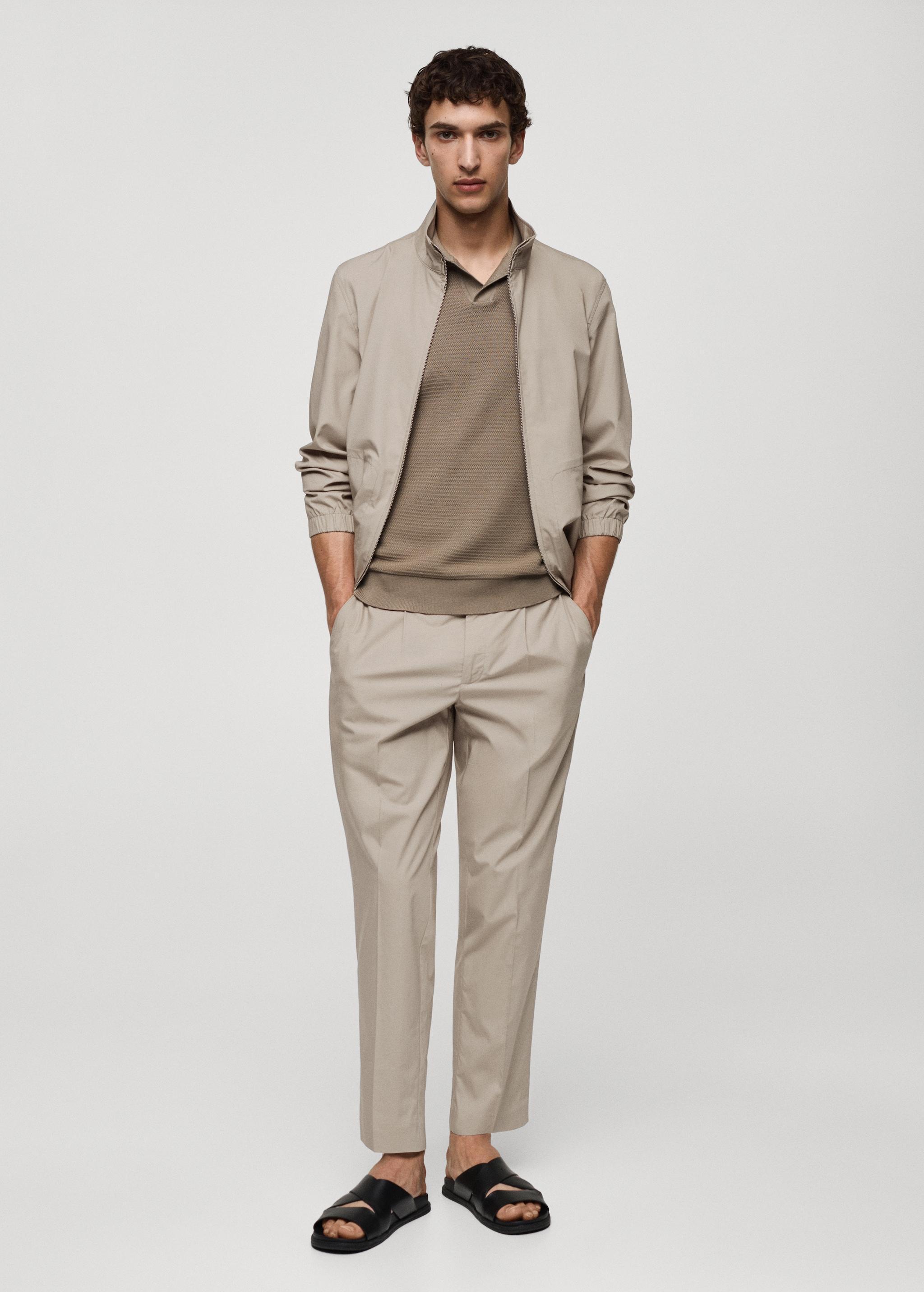 Slim-fit lyocell pleated trousers - Men | MANGO USA Product Image