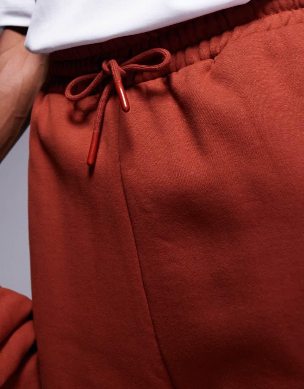 ASOS DESIGN premium heavyweight oversized sweatpants in burnt red Product Image