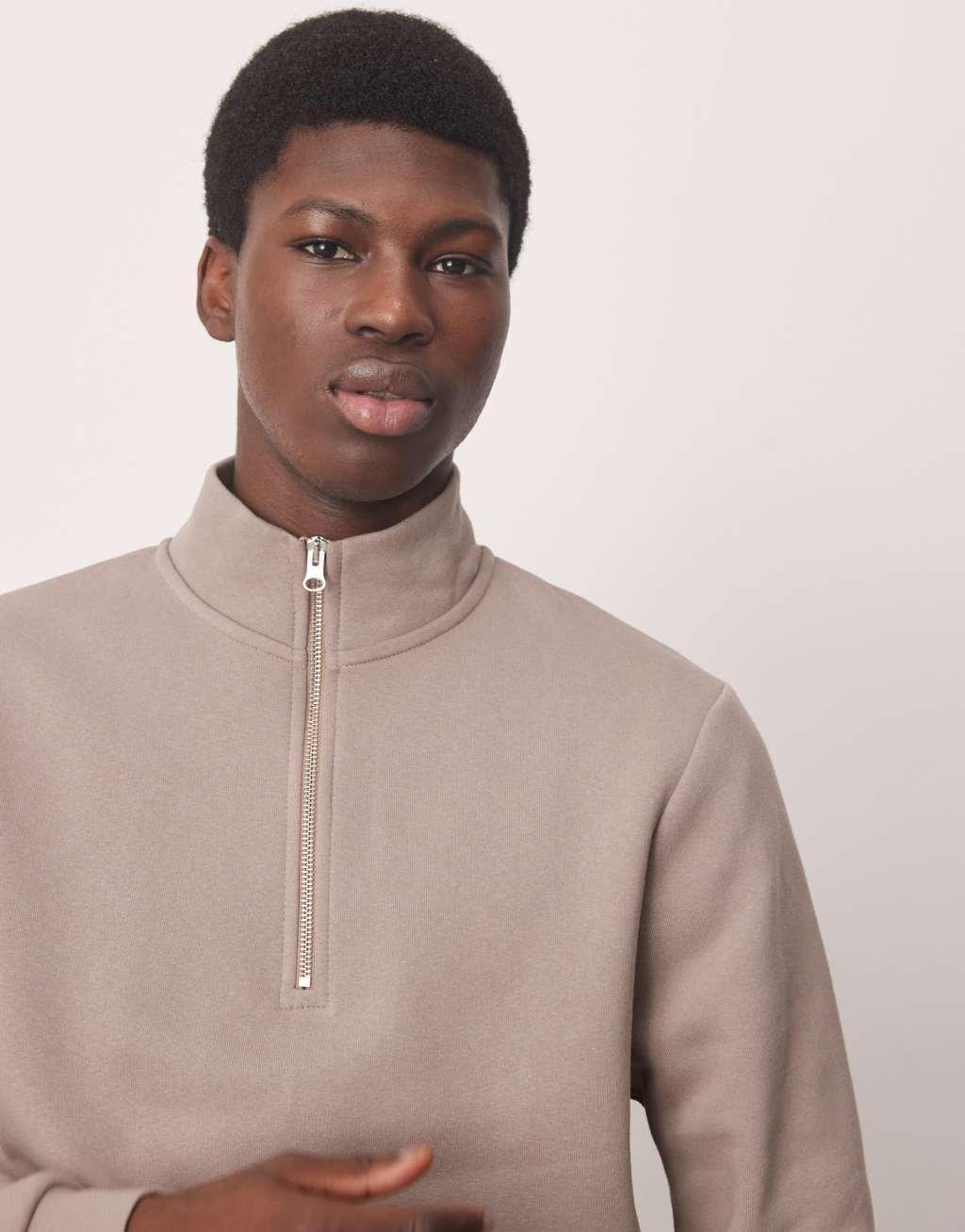 ASOS DESIGN quarter zip sweatshirt in brown Product Image