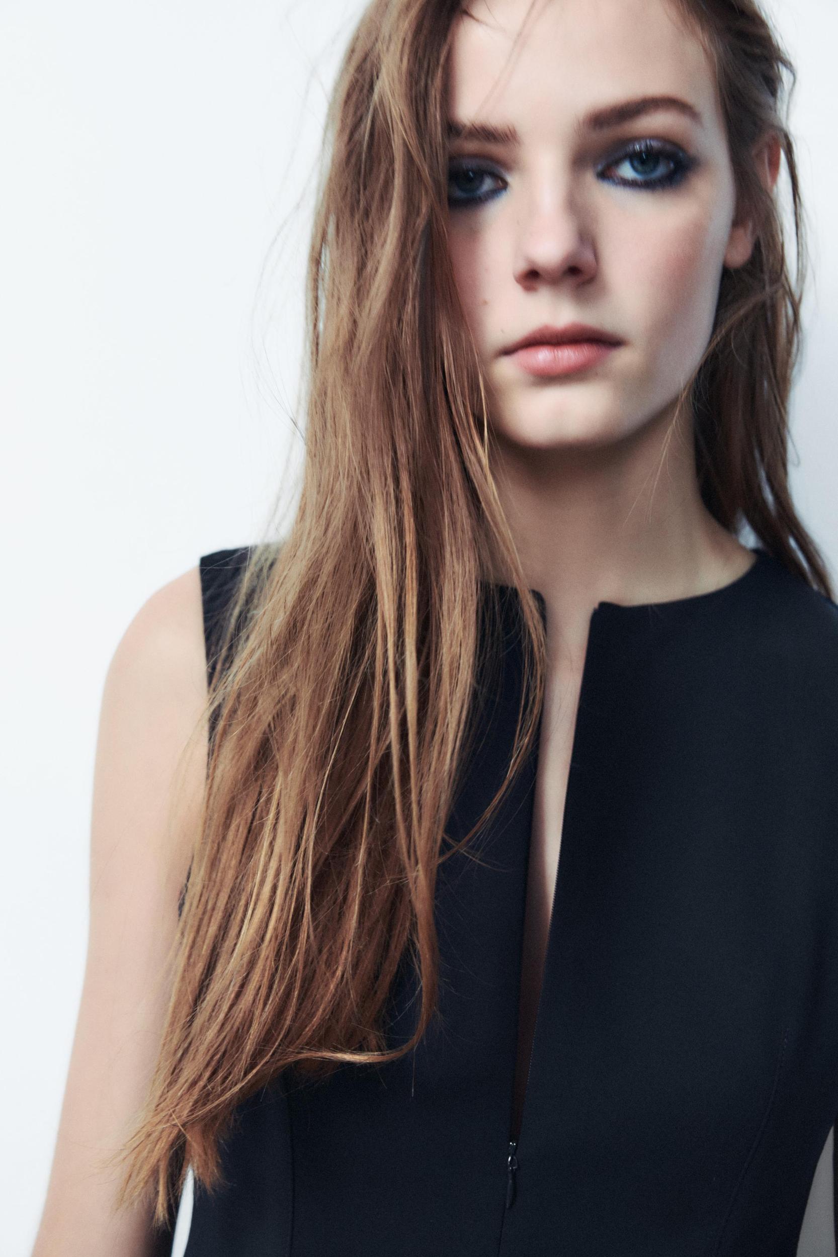 DART PEPLUM TOP Product Image