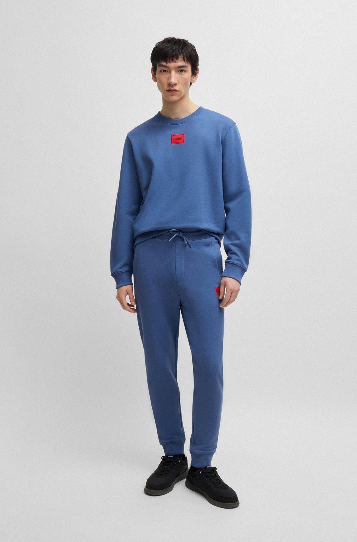 Logo-label tracksuit bottoms in cotton terry Product Image