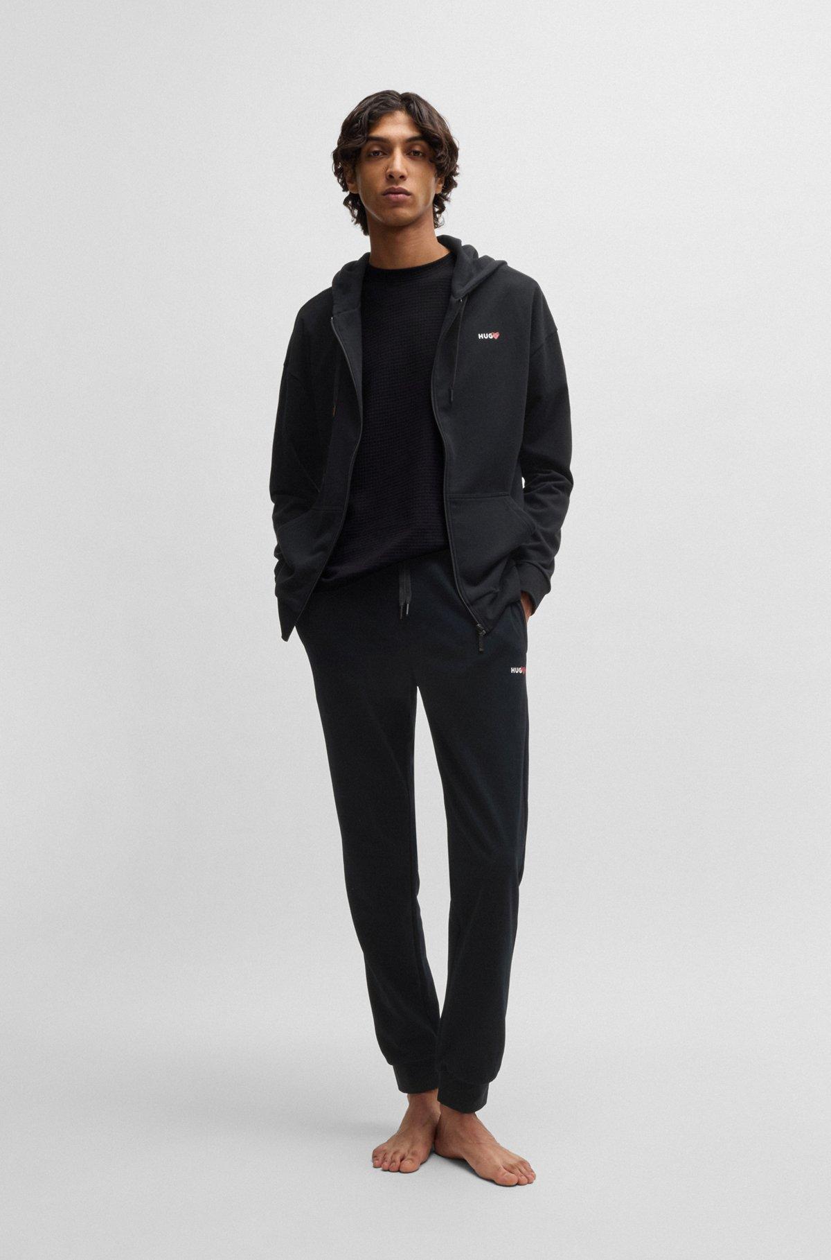  tracksuit bottoms with heart logo Product Image