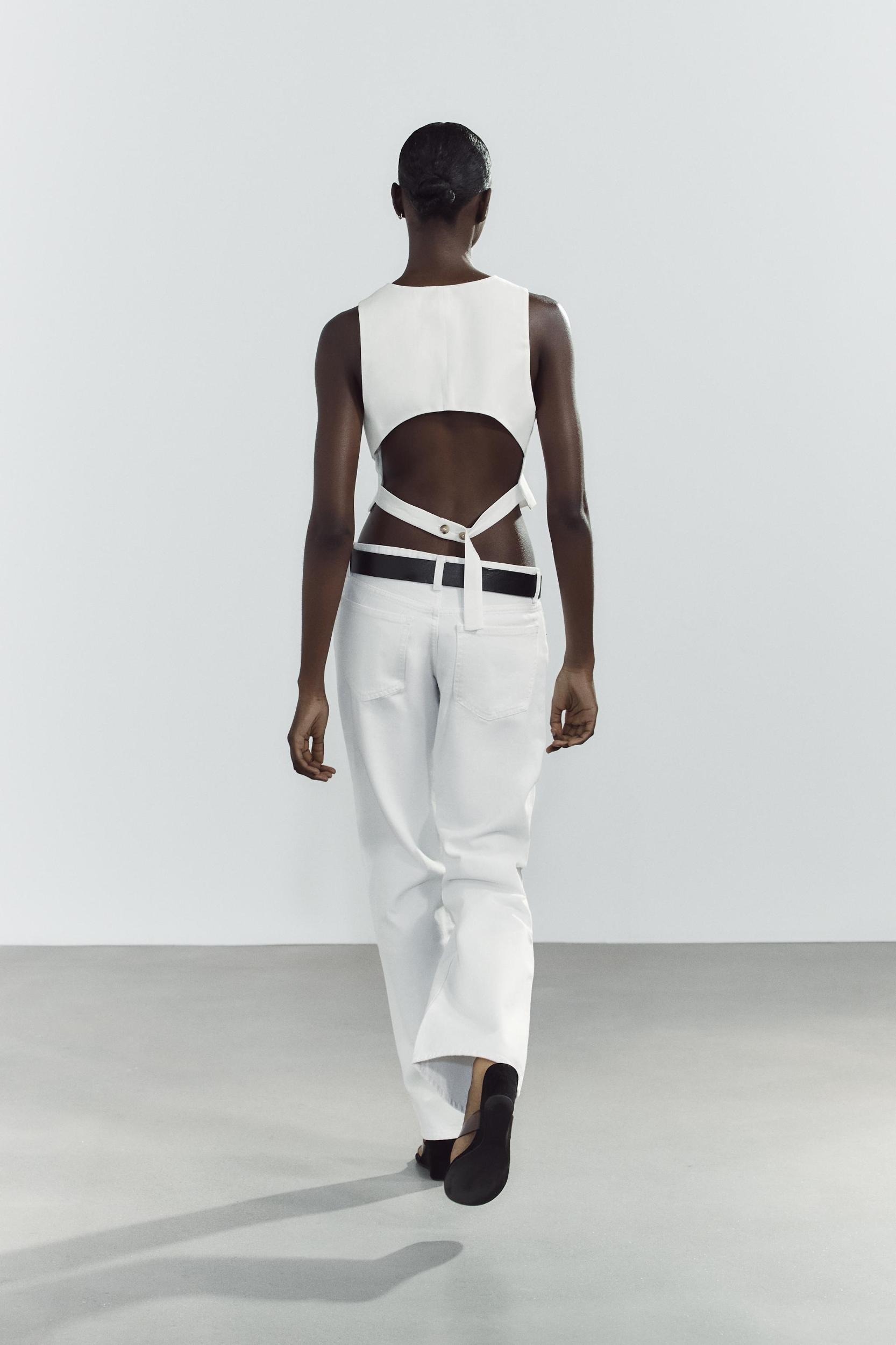 BACK CUT OUT VEST Product Image