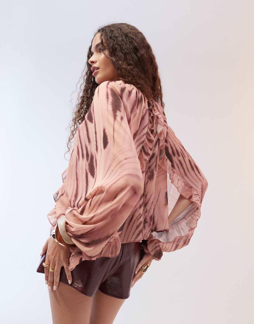 ASOS DESIGN ruffle detail cape sleeve chiffon top in woodland print Product Image