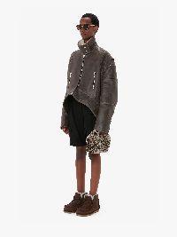 CURVED LEATHER HEM HIGH NECK JACKET in brown | JW Anderson US  Product Image