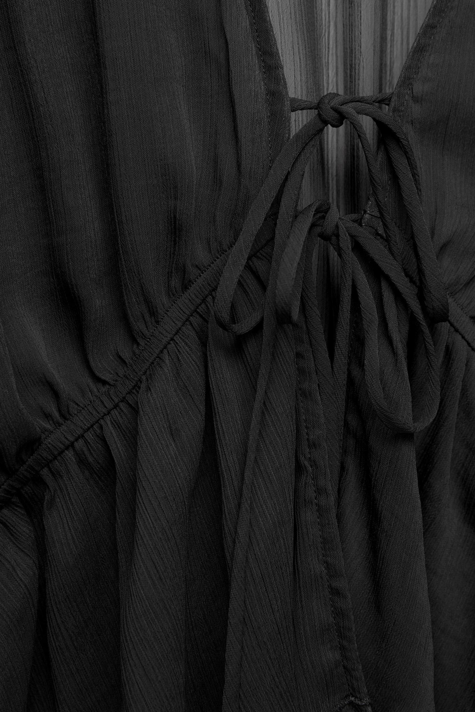 Flowing blouse with ruffles Product Image