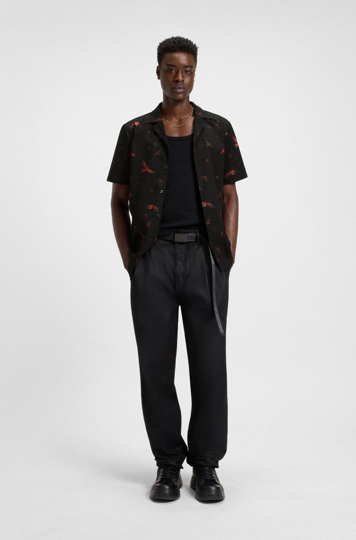 HUGO - Relaxed-fit shorts in printed cotton poplin - Black Product Image