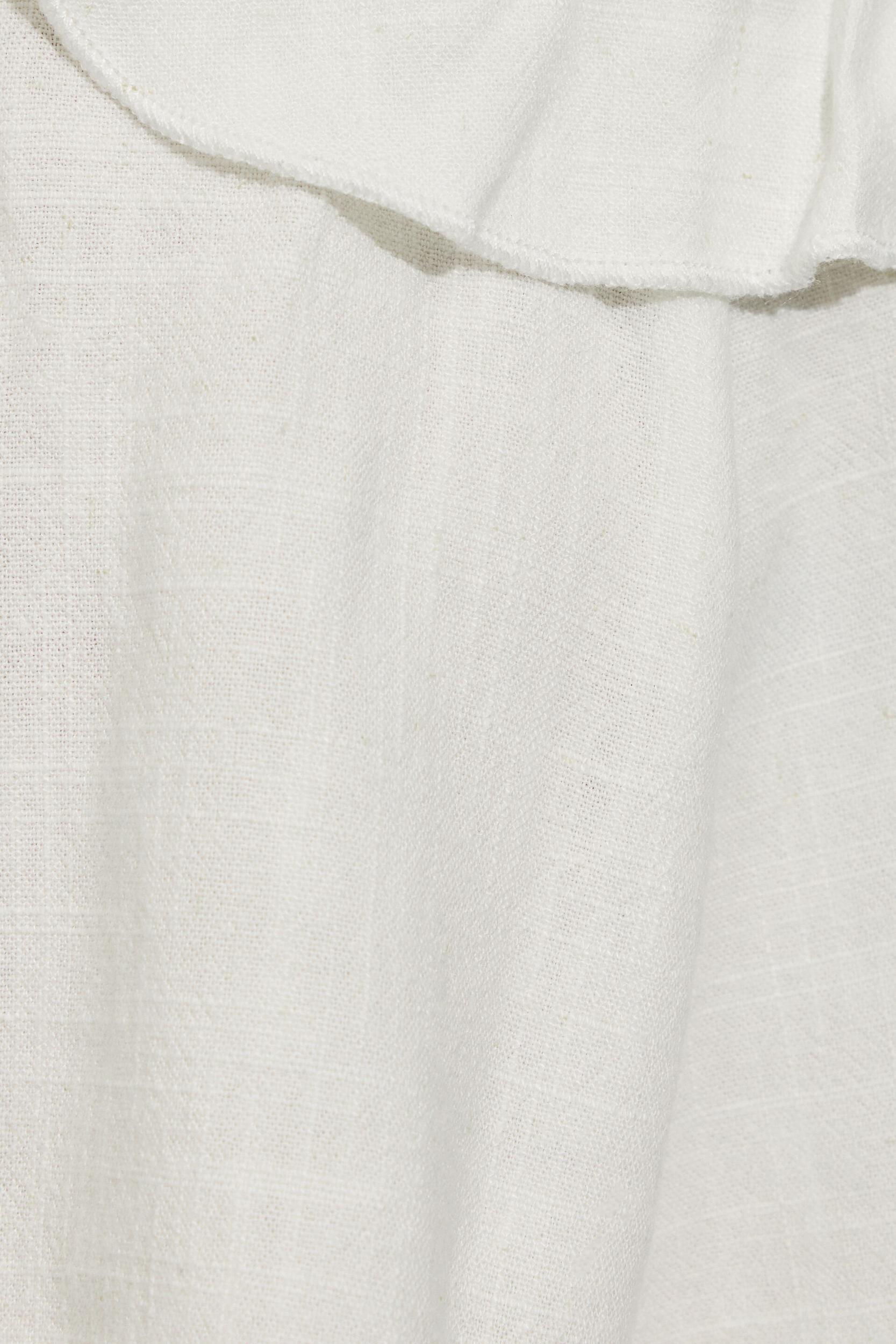 Strappy Peplum Cami Top Product Image