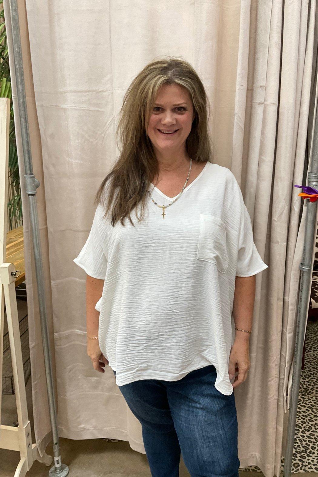 Woven v-neck pocket top Product Image