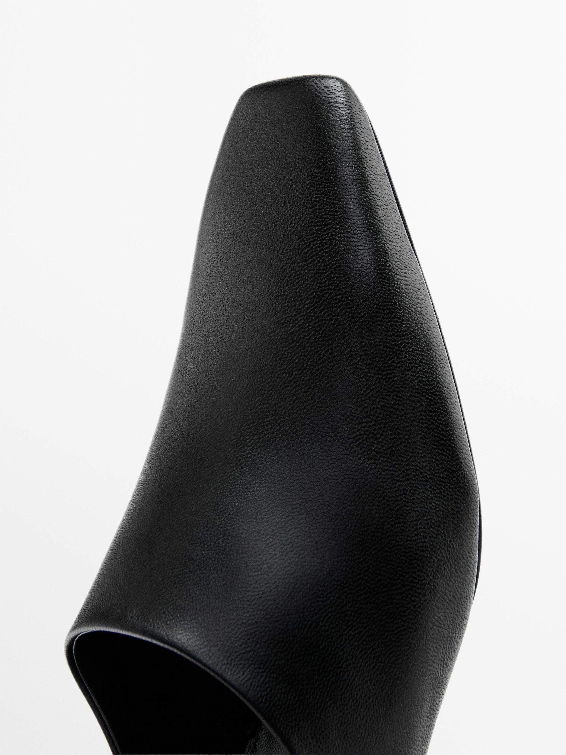 Wedge heeled mules Product Image