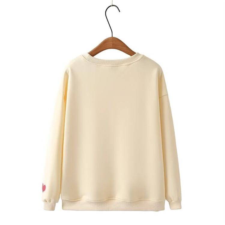 Plus Size Round Neck Heart Print Fleece-Lined Pullover Product Image