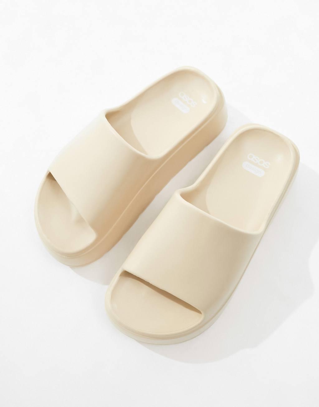 ASOS DESIGN Freedom cleated flatform slides in off-white Product Image