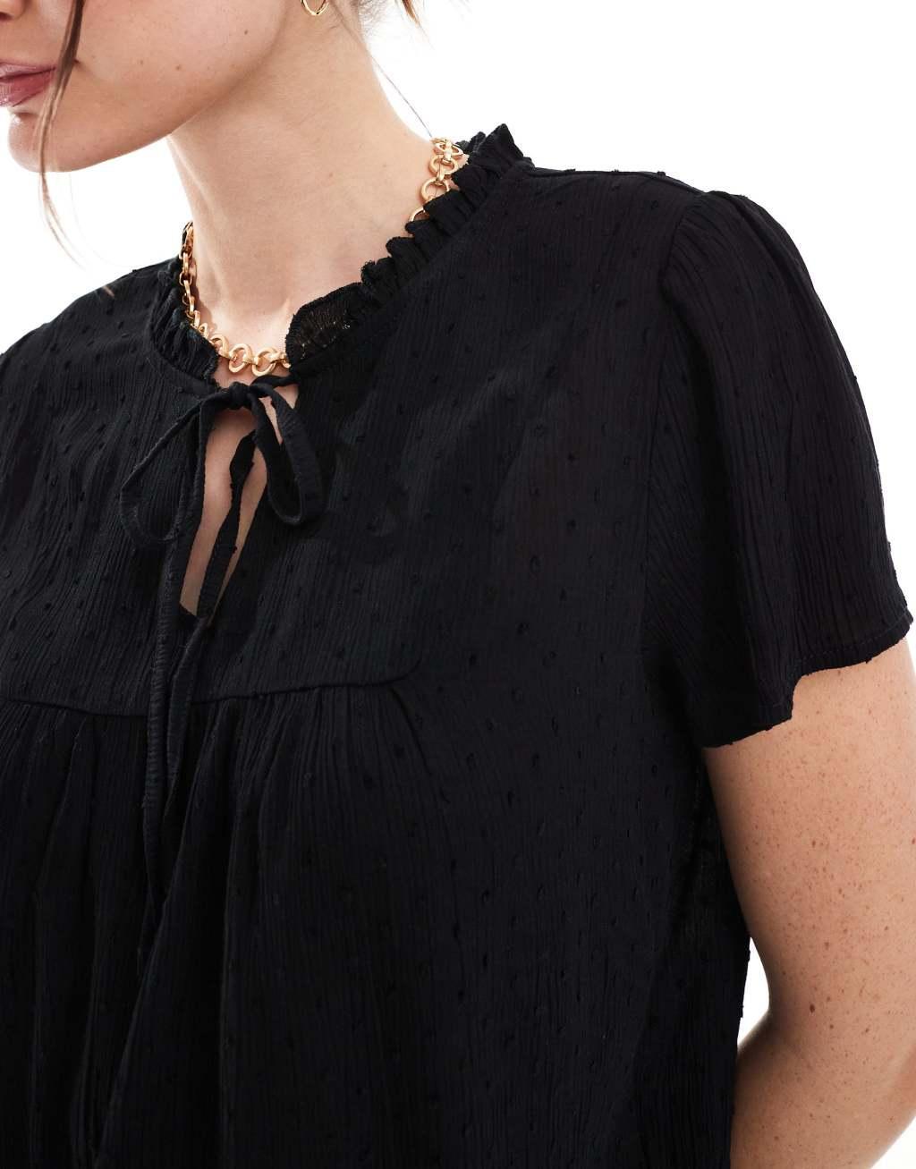 JDY eyelet pussybow blouse in black Product Image