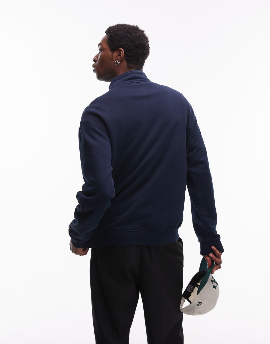Tommy Jeans varsity patch 1/4 zip sweatshirt in navy Product Image