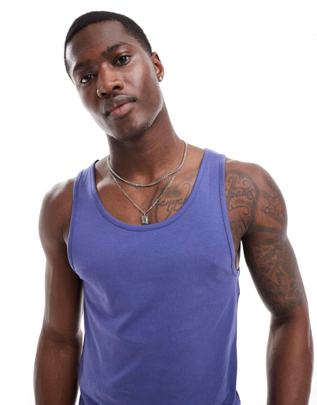 ASOS DESIGN muscle fit tank top in navy Product Image