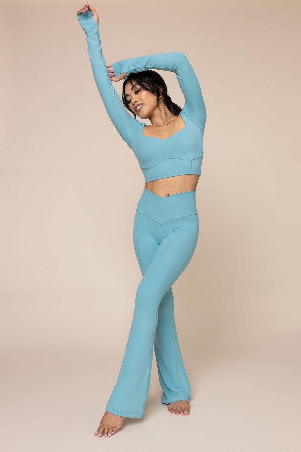 Crisscross Hourglass® Flared Leggings with Pockets - Oasis Product Image