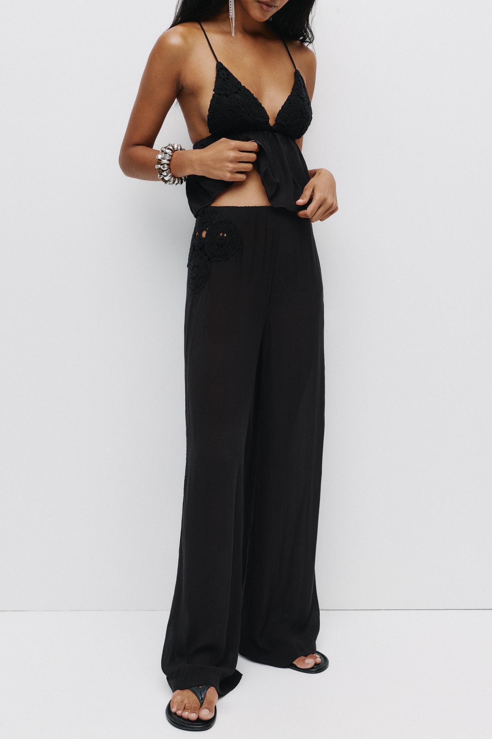 Rustic crochet embroidered trousers Product Image