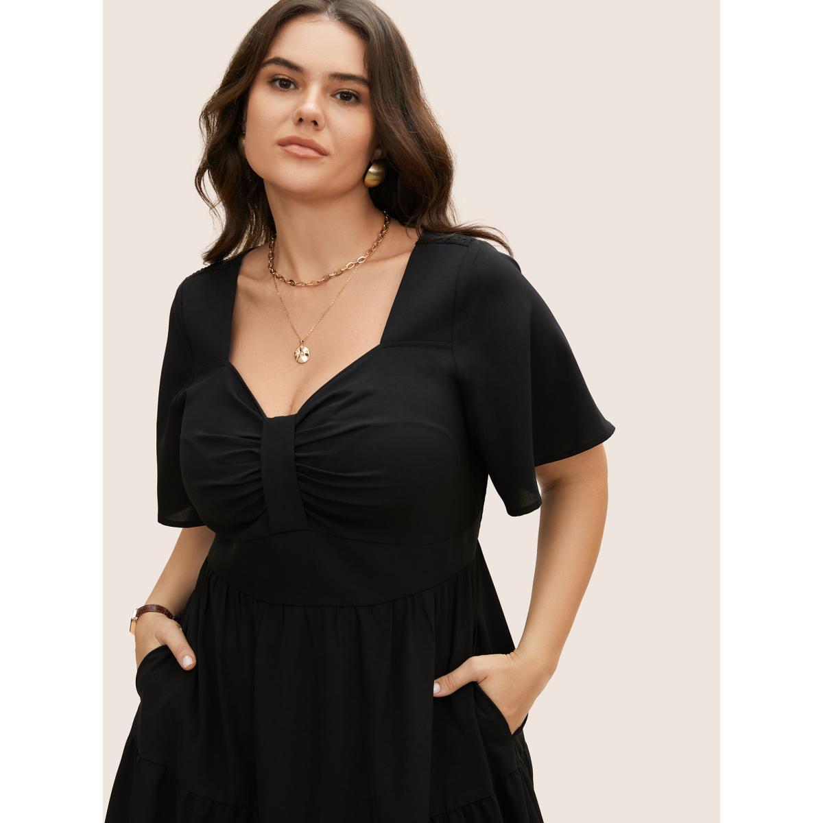Plus Size Heart Neckline Ruched Ruffle Layered Hem Dress Black Women Elegant Gathered Heart neckline Short sleeve Curvy BloomChic 12/L Product Image