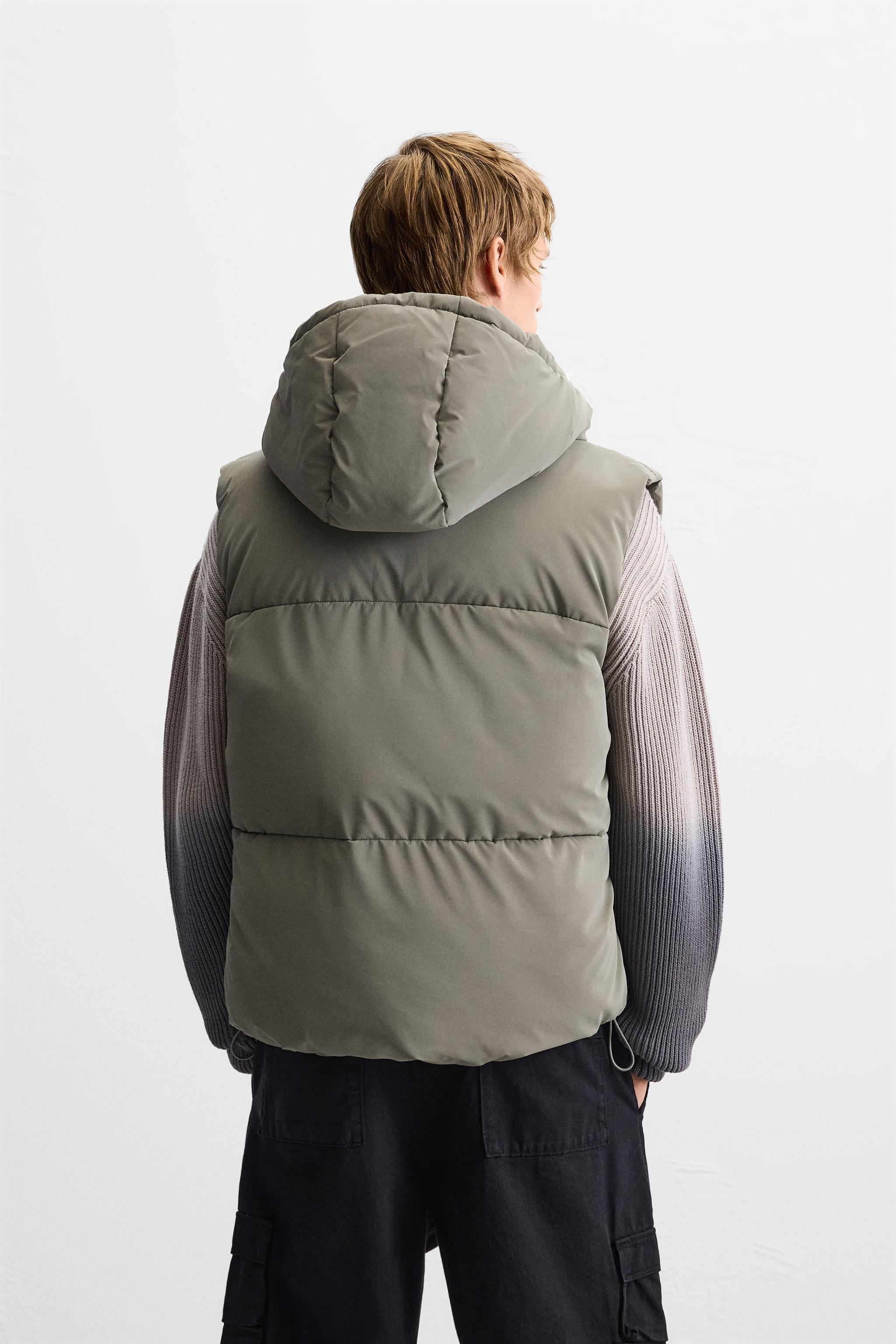 RUBBERIZED HOODED PUFFER VEST Product Image