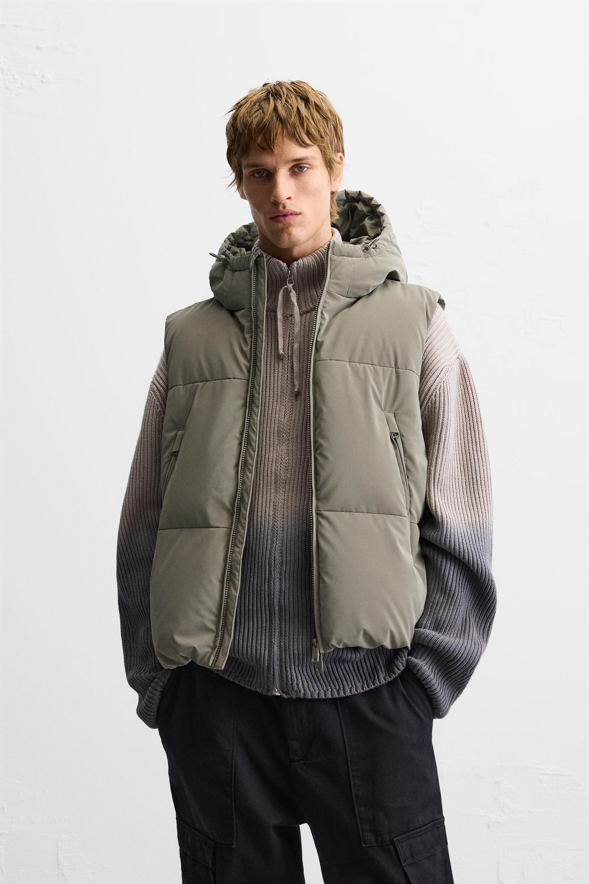 RUBBERIZED HOODED PUFFER VEST Product Image