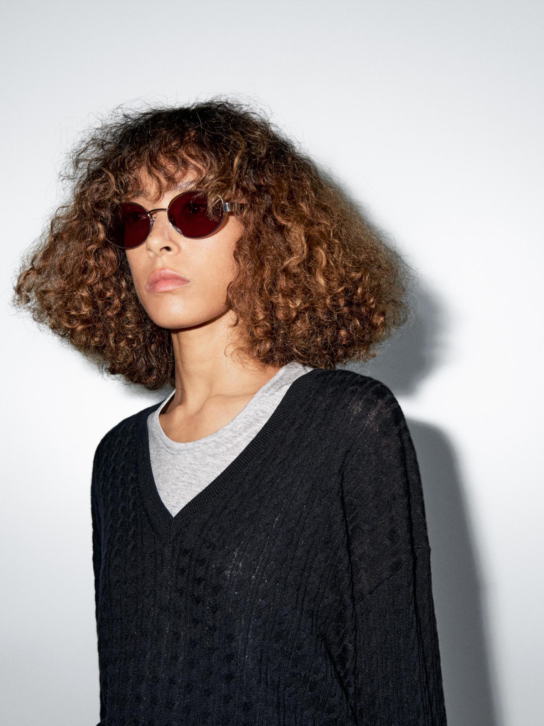 V-neck cable-knit sweater Product Image