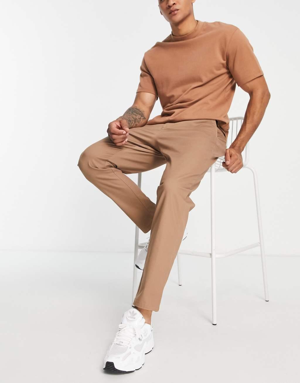 ASOS DESIGN tapered chinos in beige Product Image