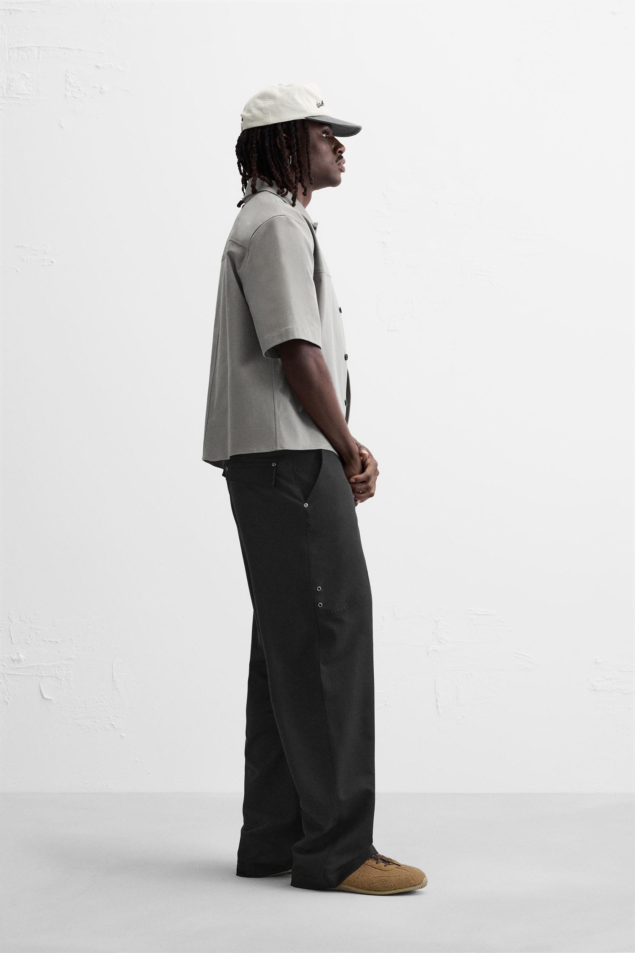 FLARED FIT PANTS WITH SEAMS Product Image