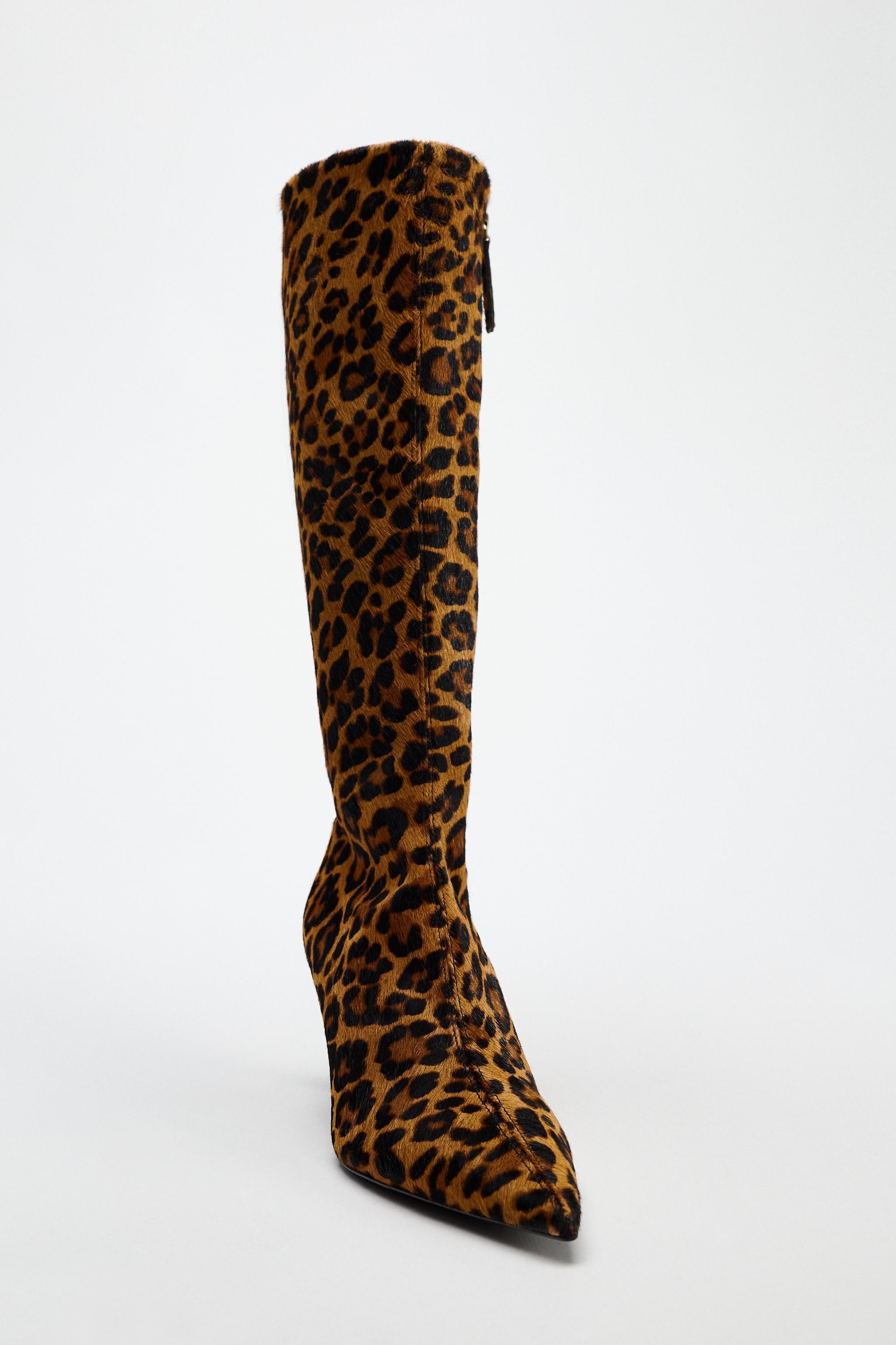 ANIMAL PRINT HEELED LEATHER BOOTS Product Image