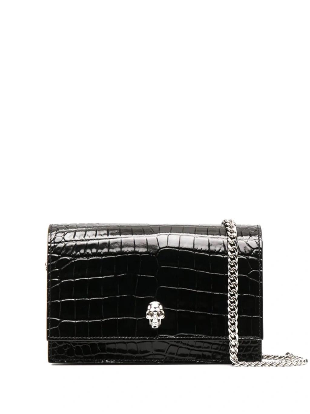 ALEXANDER MCQUEEN Skull-embellished Clutch Bag In Black Product Image