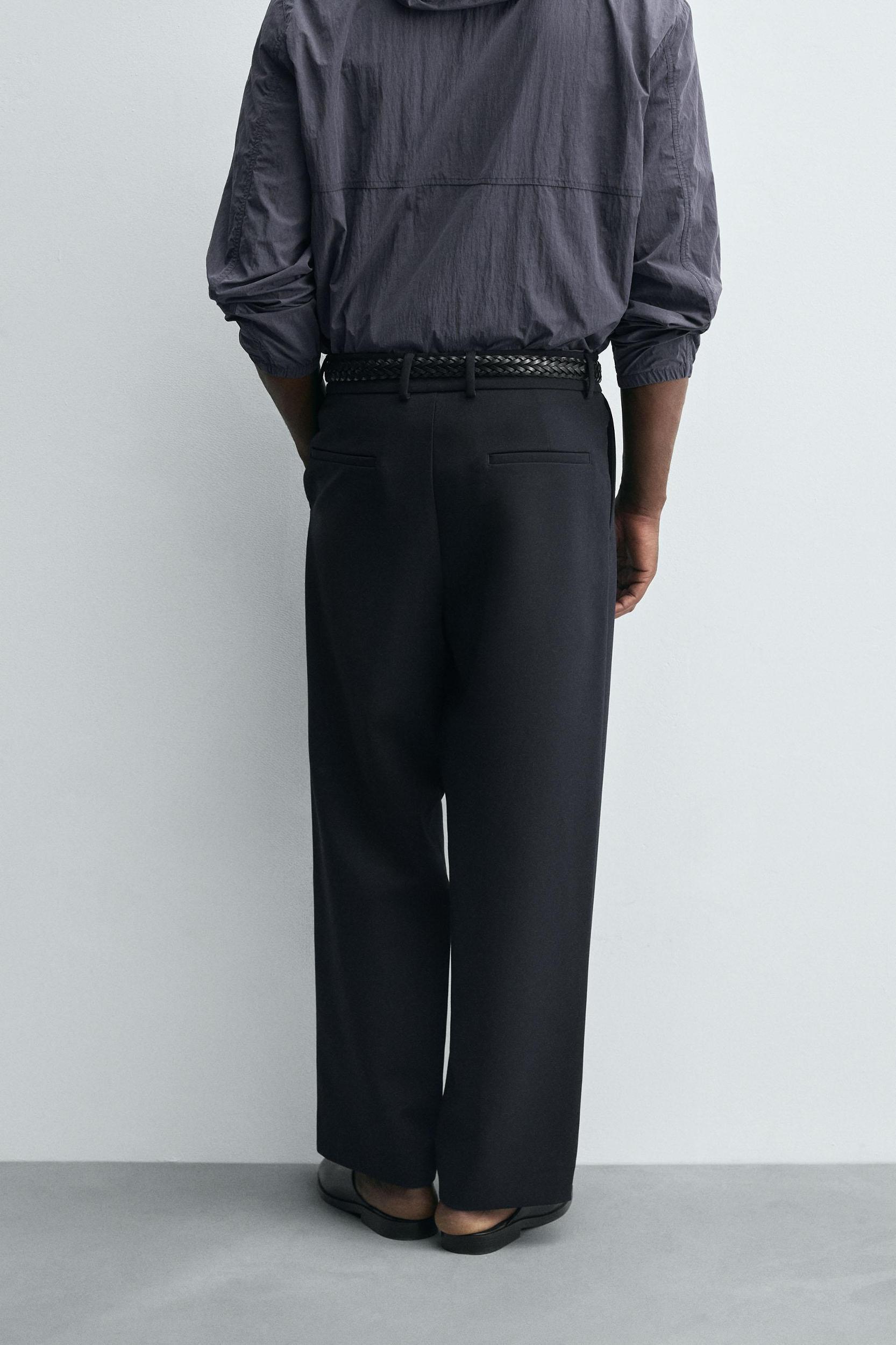 RELAXED FIT PLEATED PANTS Product Image