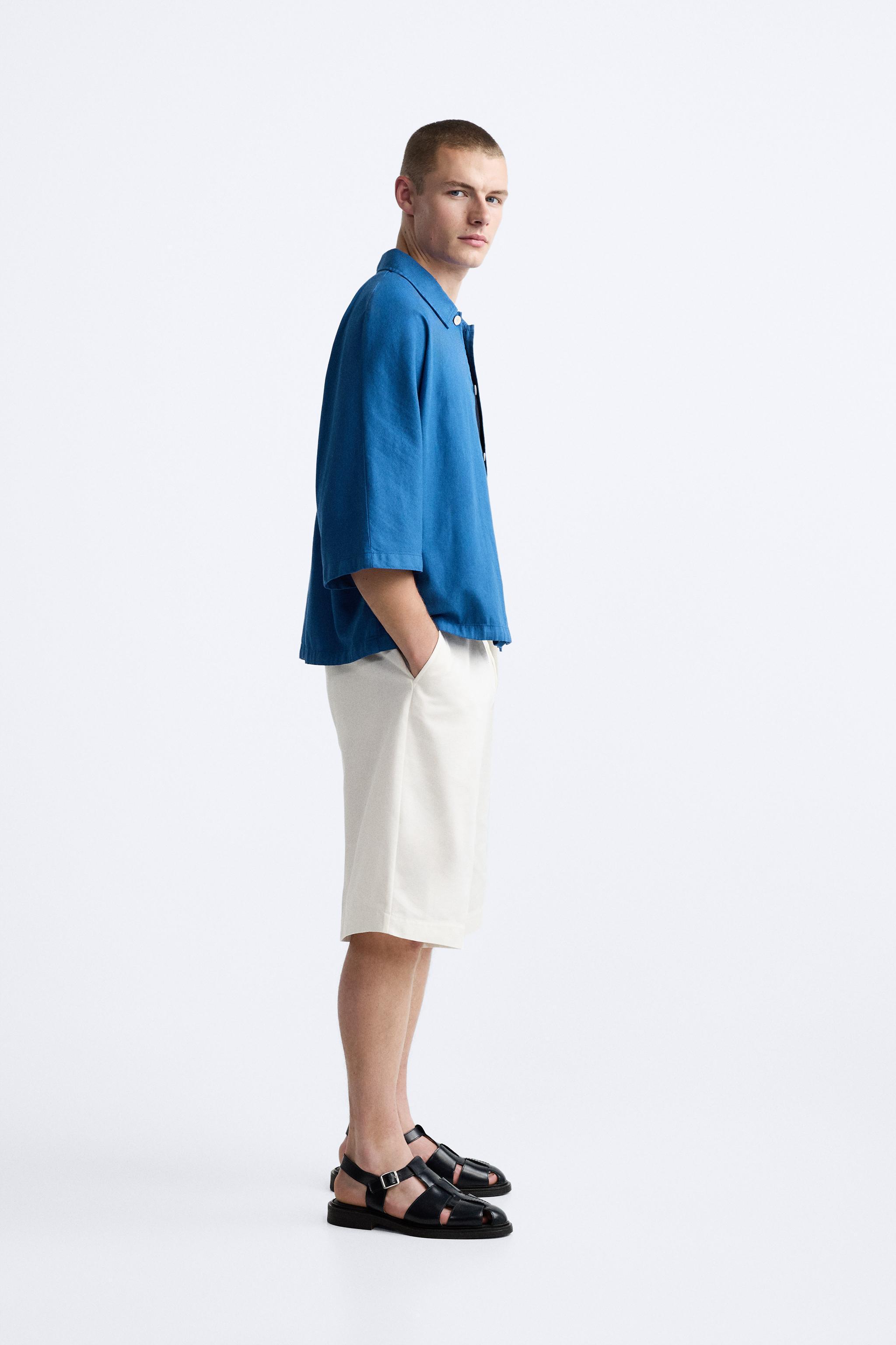 PLEATED BELTED SHORTS Product Image