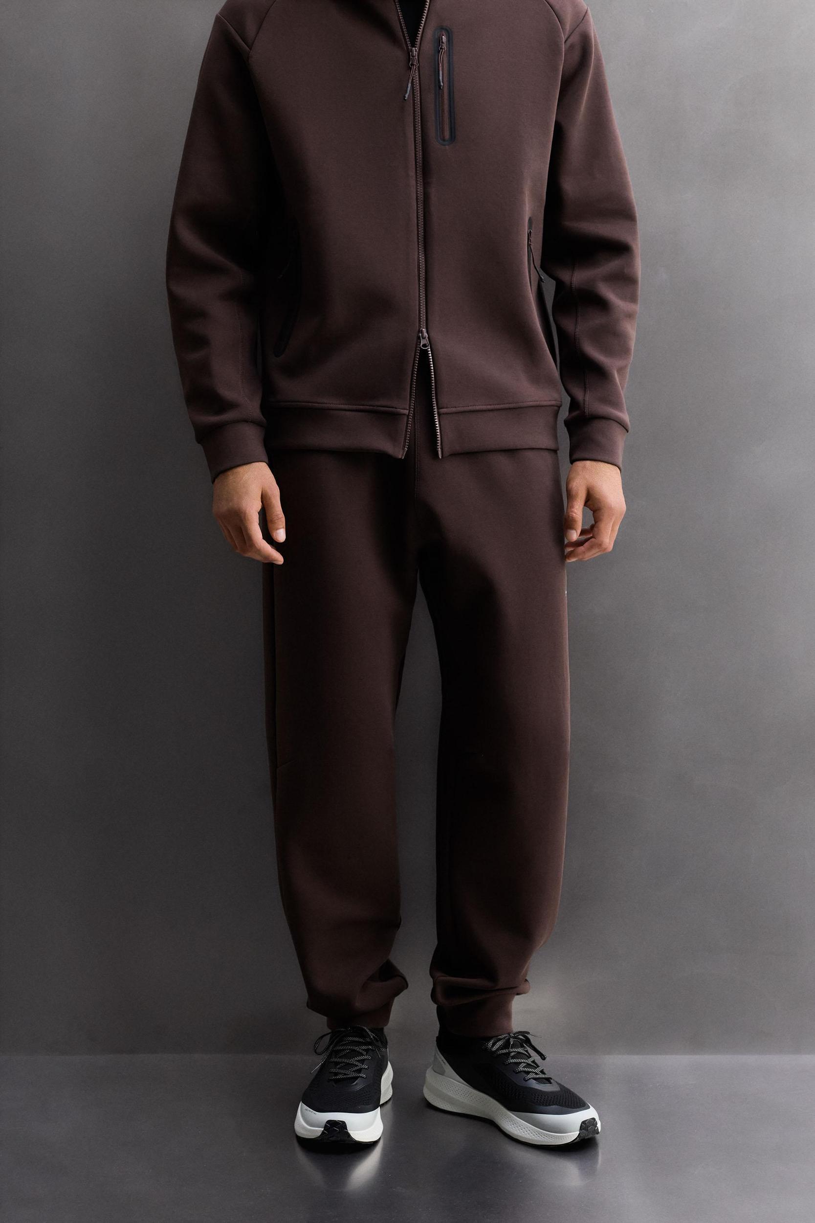 TECHNICAL ZIPPER PANTS Product Image