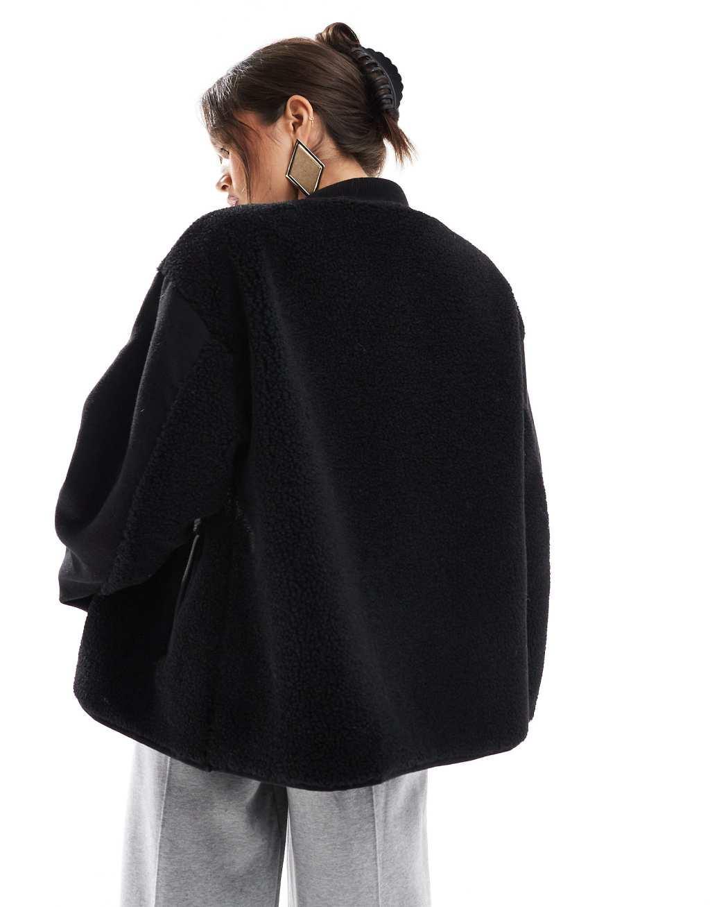 ASOS DESIGN spliced teddy formal jacket in black Product Image