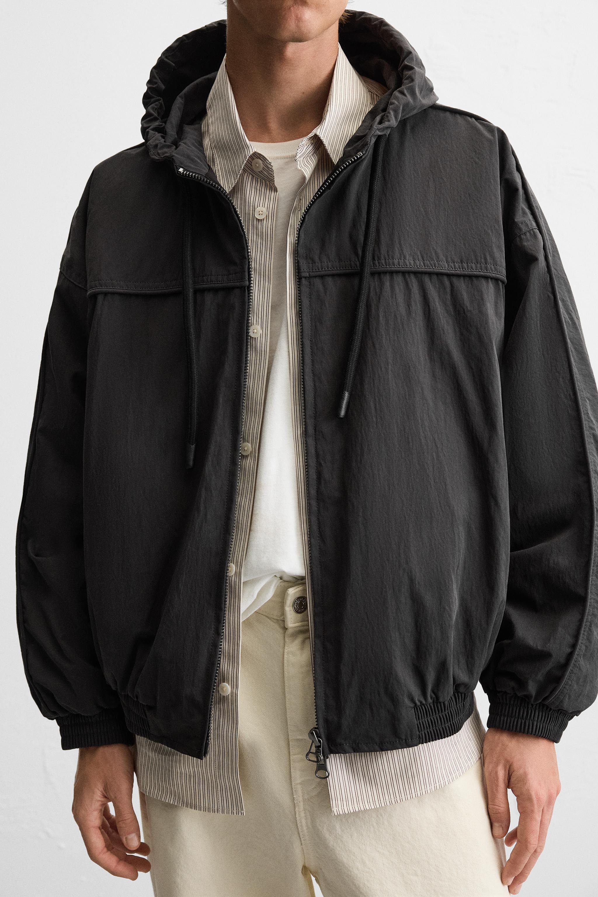 HOODED TECHNICAL JACKET Product Image