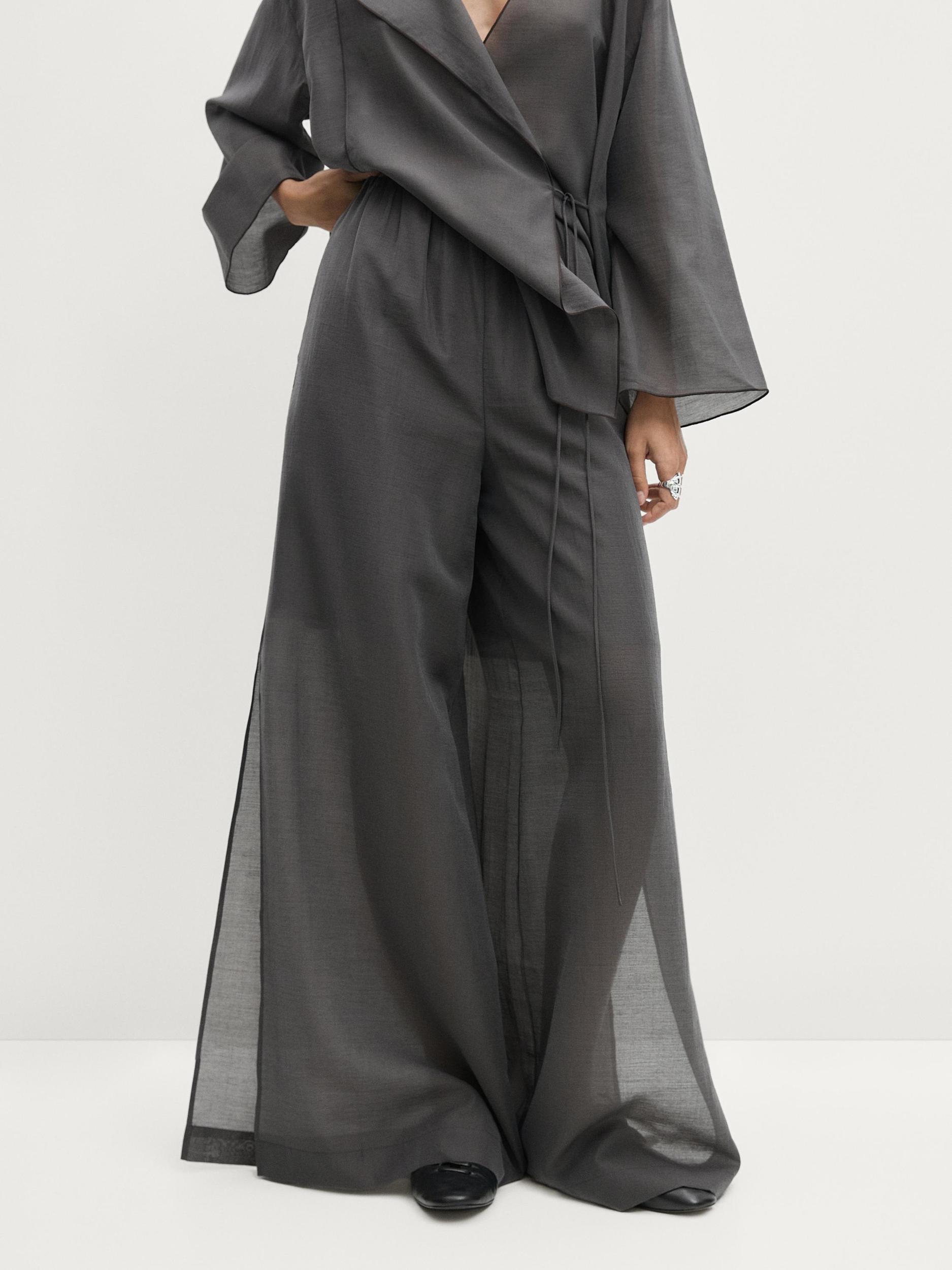 Flowing palazzo trousers Product Image