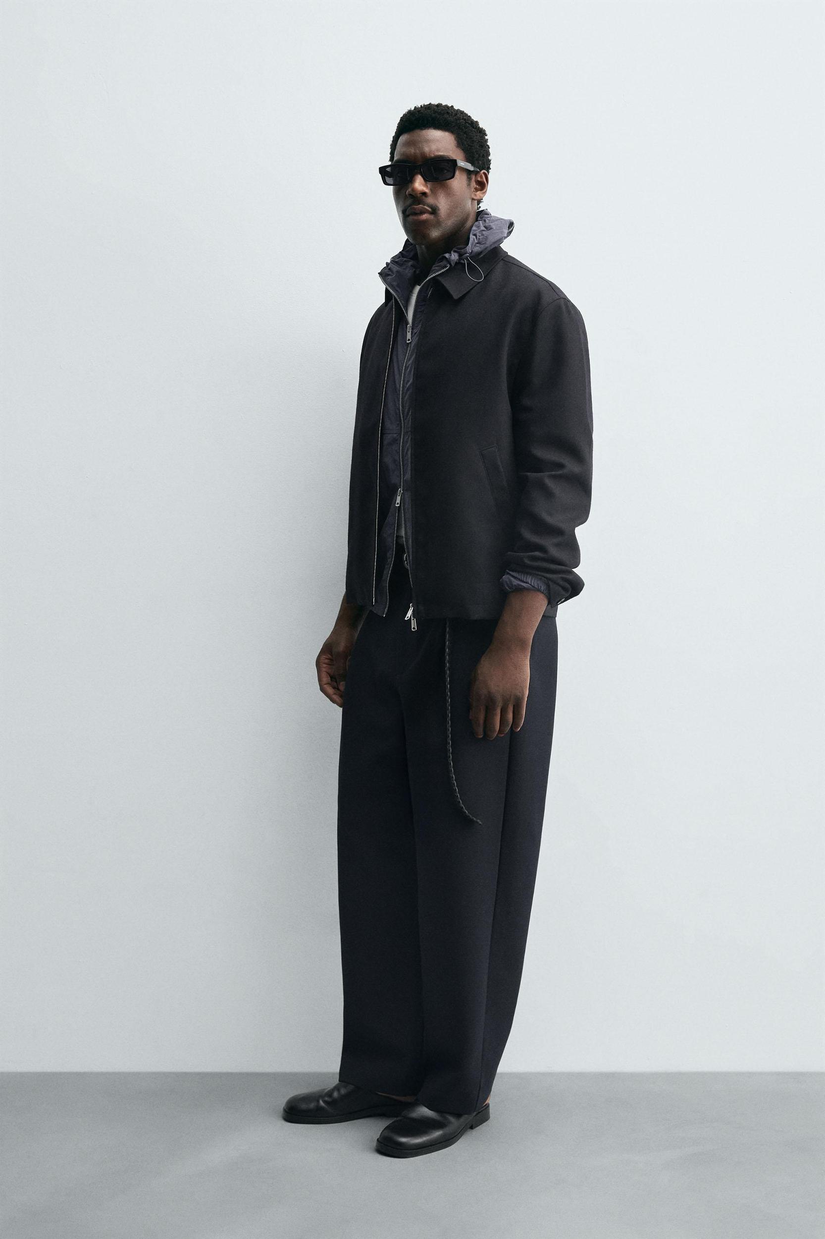 RELAXED FIT PLEATED PANTS Product Image