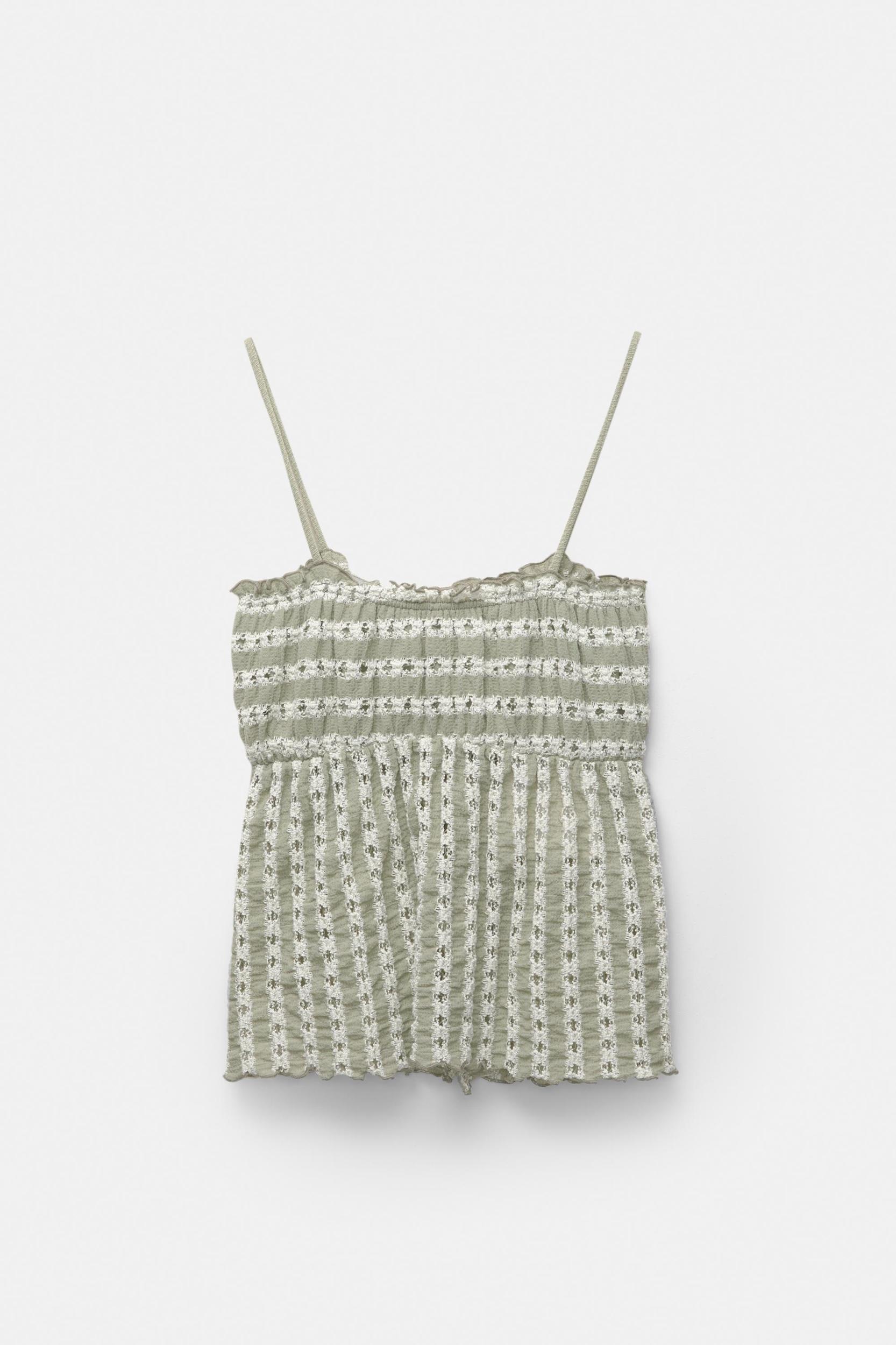 Open-knit top with bows Product Image
