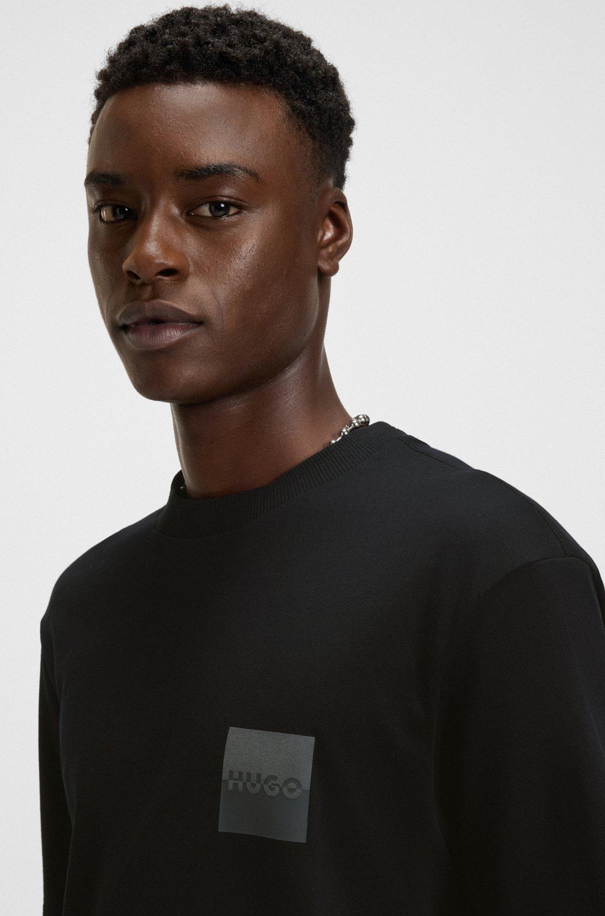 HUGO - Relaxed-fit T-shirt in cotton with split logos - Black Product Image