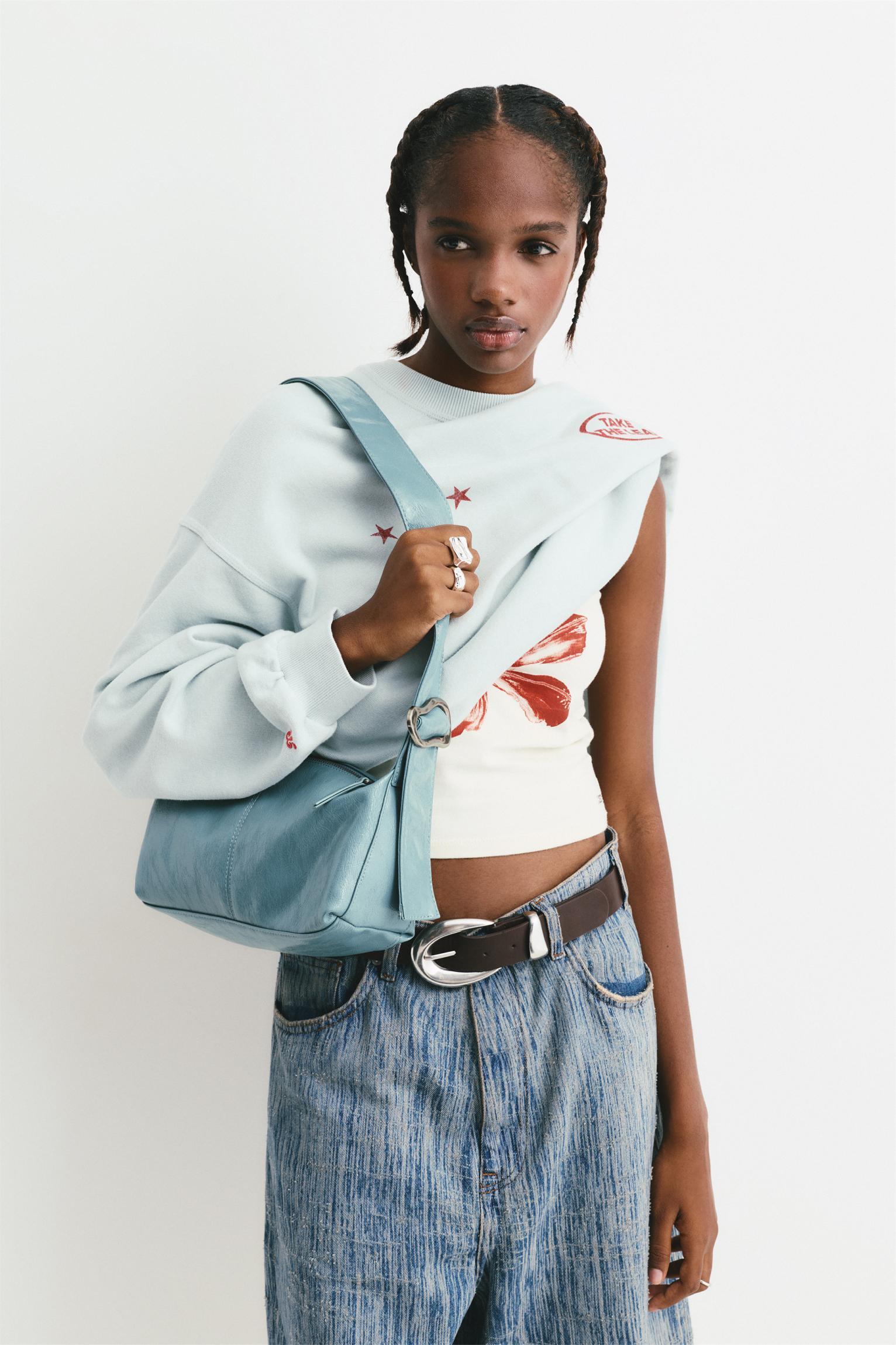 Distressed shoulder bag Product Image