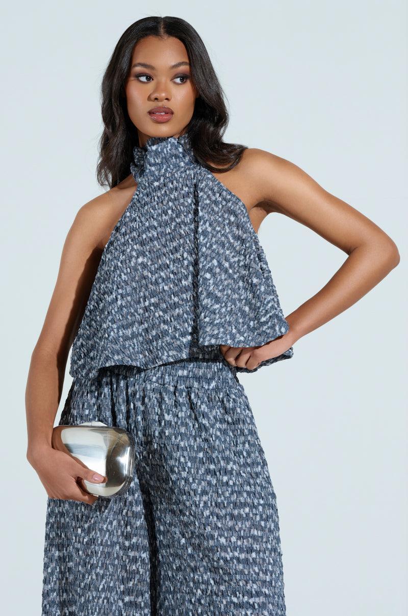 MULTI TEXTURED SLEEVELESS PEPLUM TOP Product Image