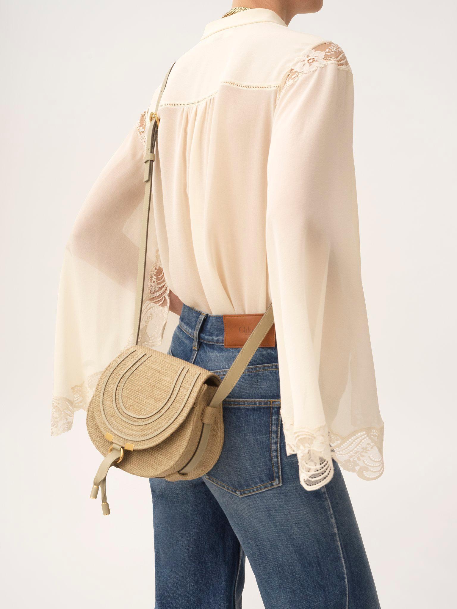 Small Marcie saddle bag in raffia-effect fibers Product Image