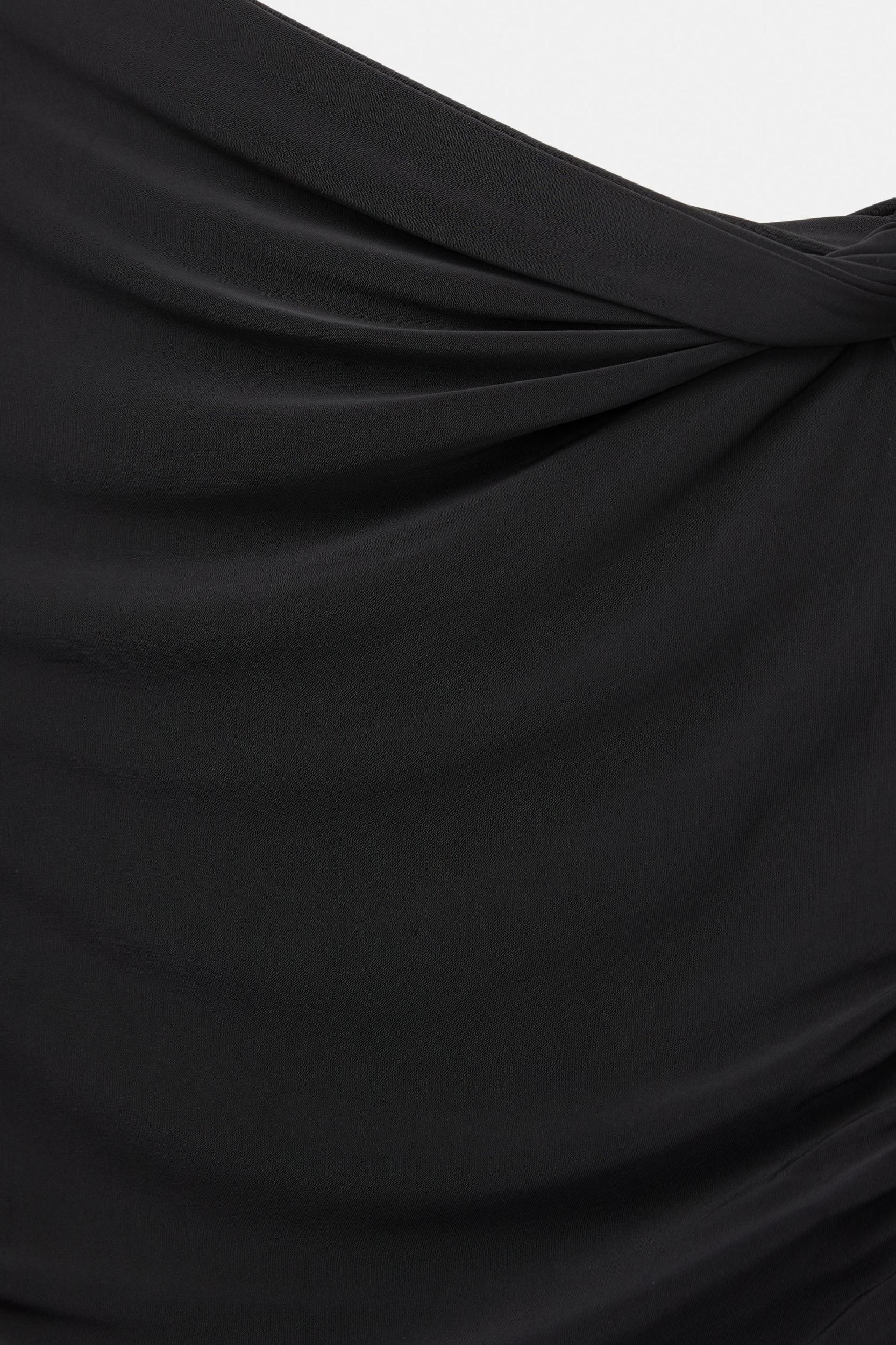 Asymmetric top Product Image