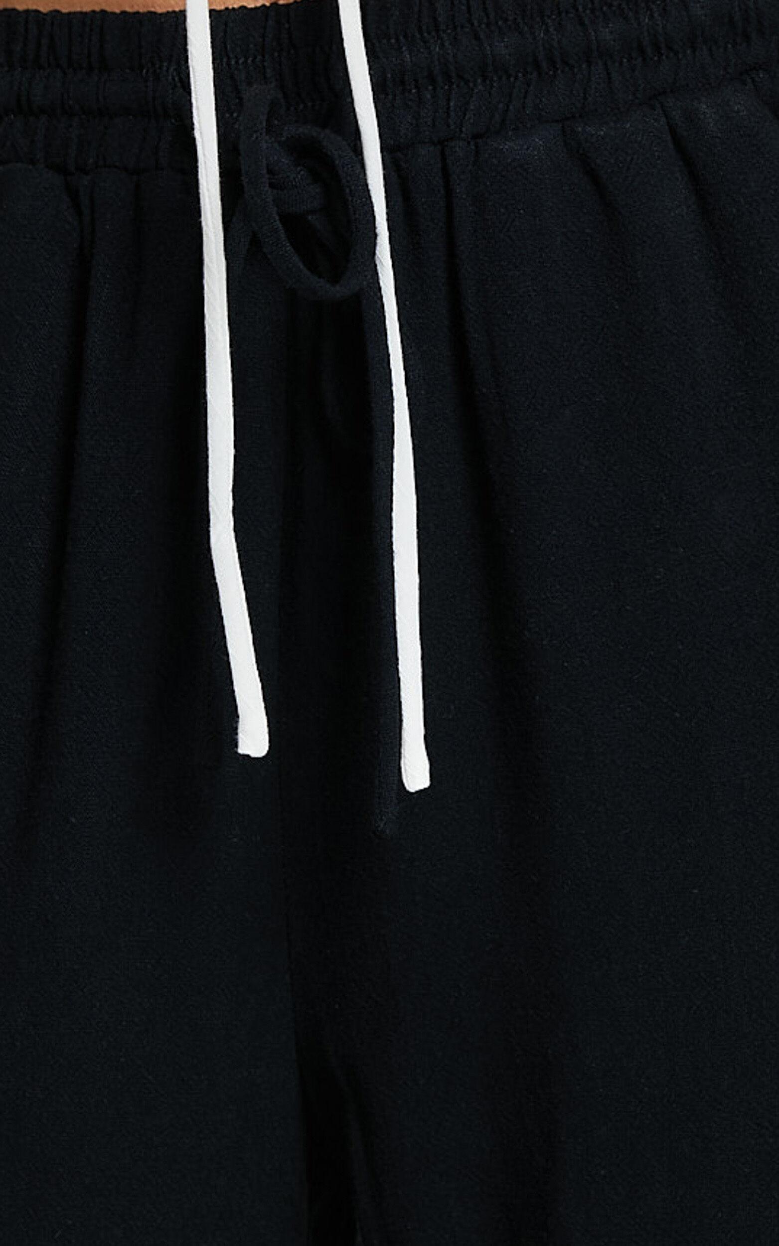 Kala Pants - Mid Waisted Relaxed Elastic Waist Pants in Black Product Image