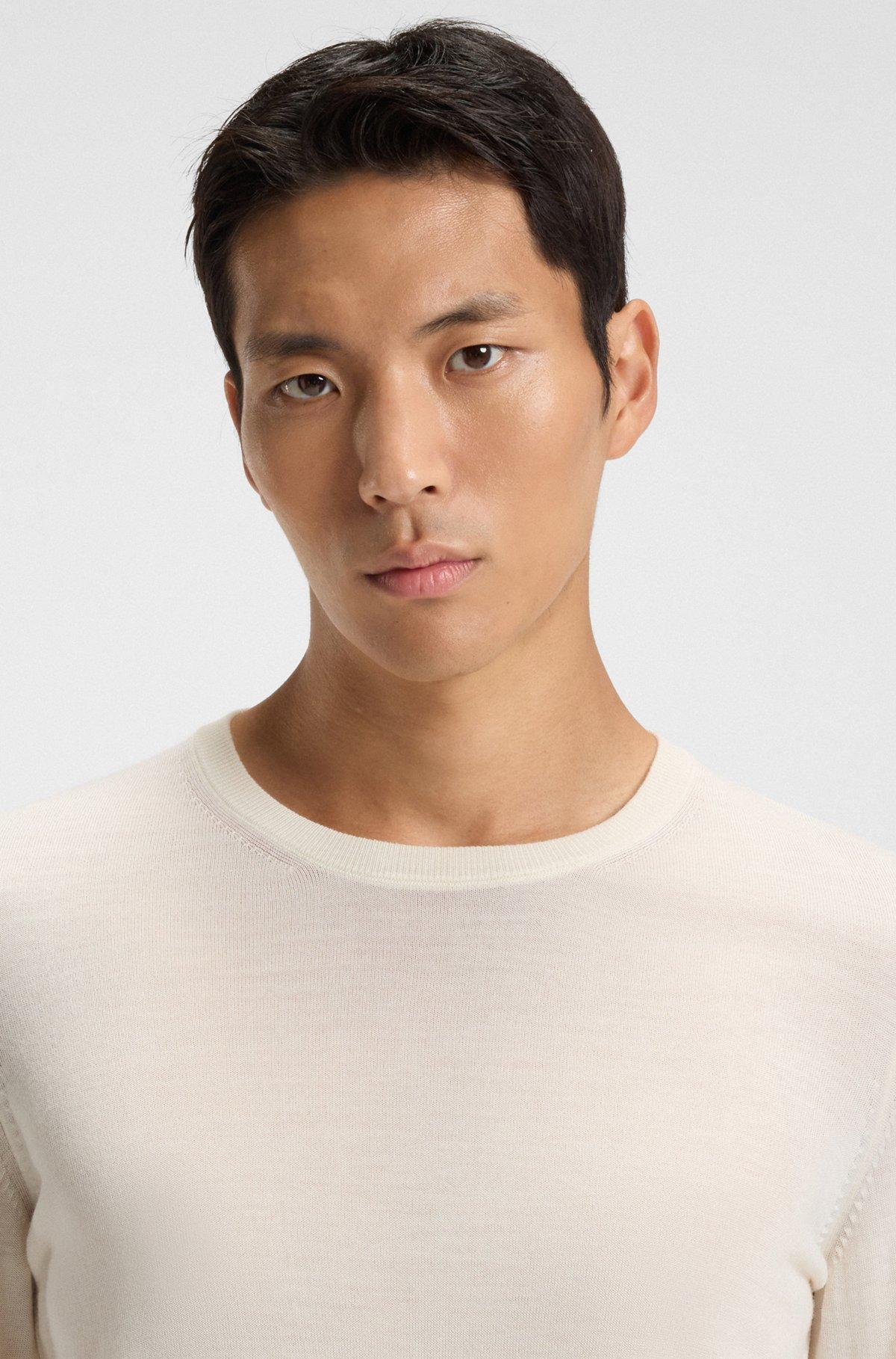 Slim-fit sweater in merino wool with crew neckline Product Image