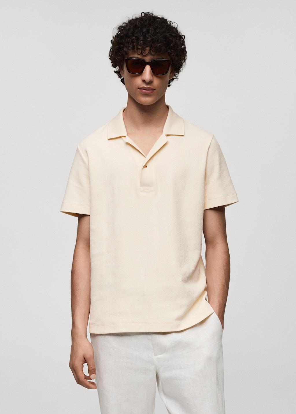 Regular-fit textured cotton polo shirt - Men | MANGO USA Product Image