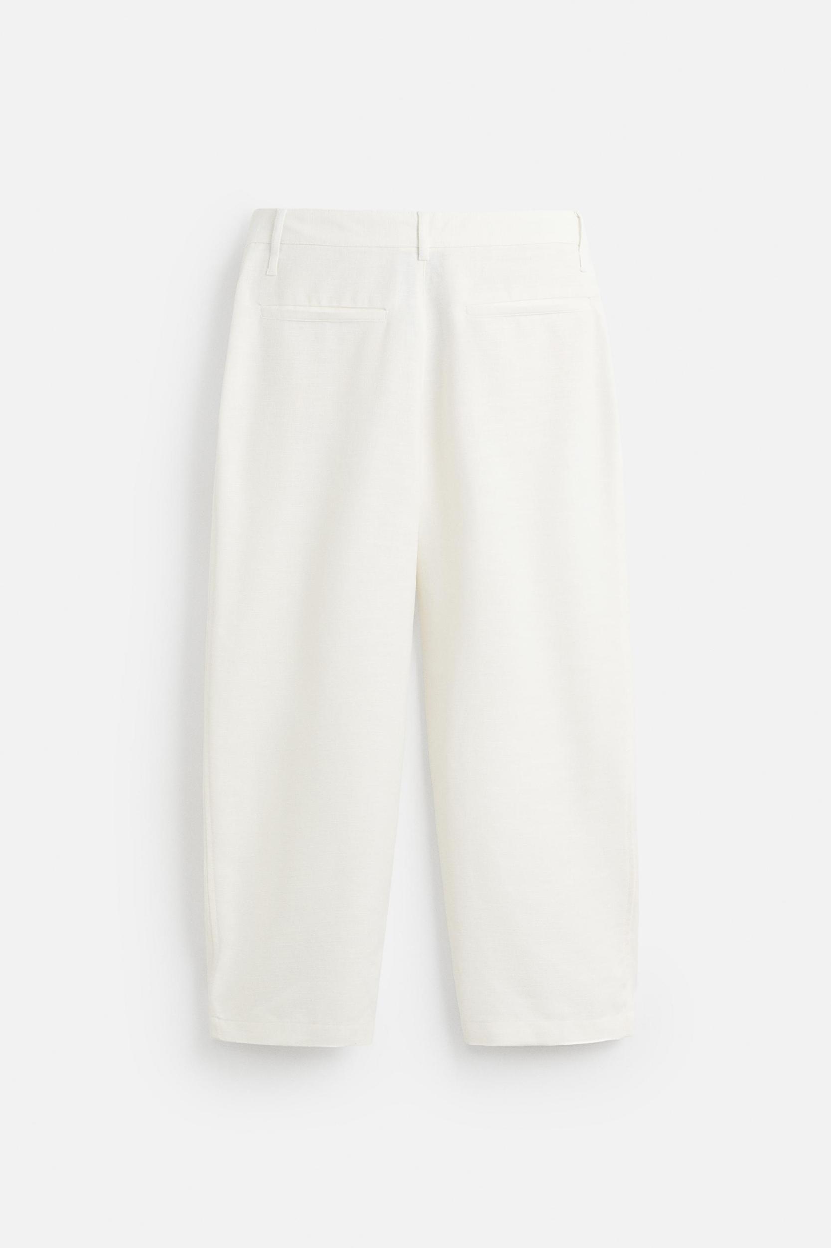 PLEATED RELAXED FIT PANTS Product Image