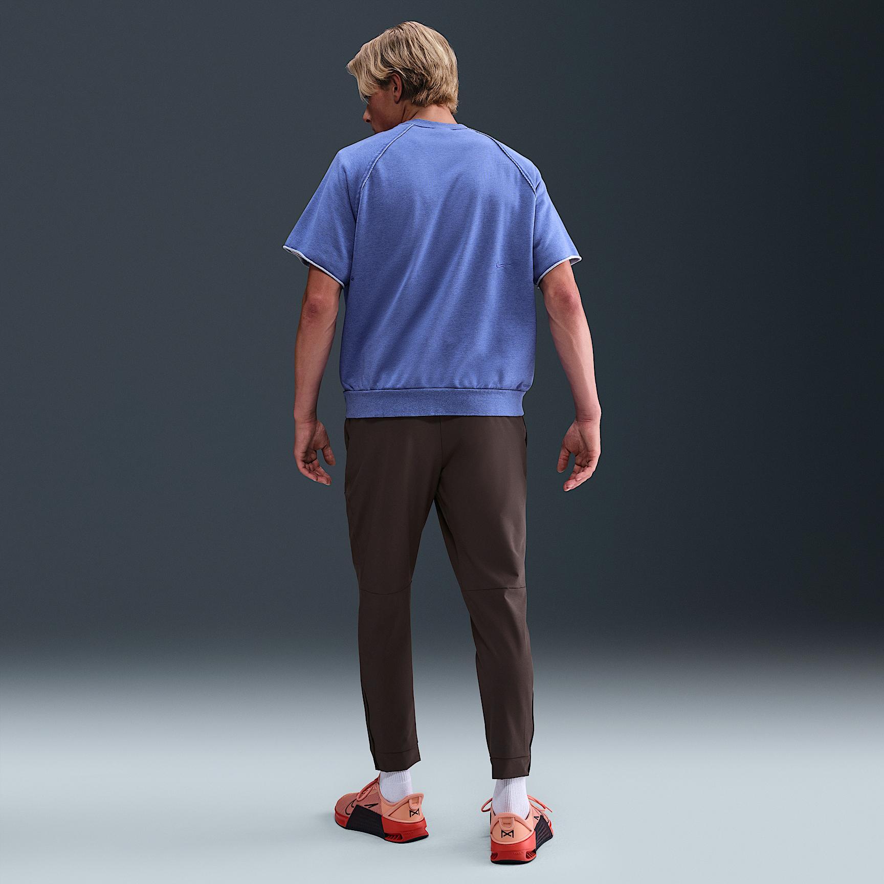 Nike Mens Unlimited Dri-FIT Zippered Cuff Versatile Pants | FB7548-237 Product Image